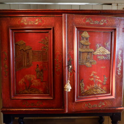 18th century cabinet with Chinese décor on a red lacquer background ca.1790