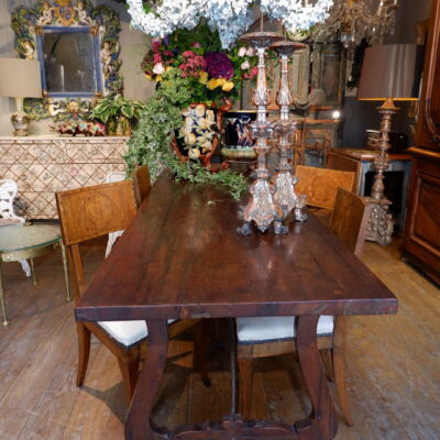 Large walnut table with wrought-iron braces 19th century