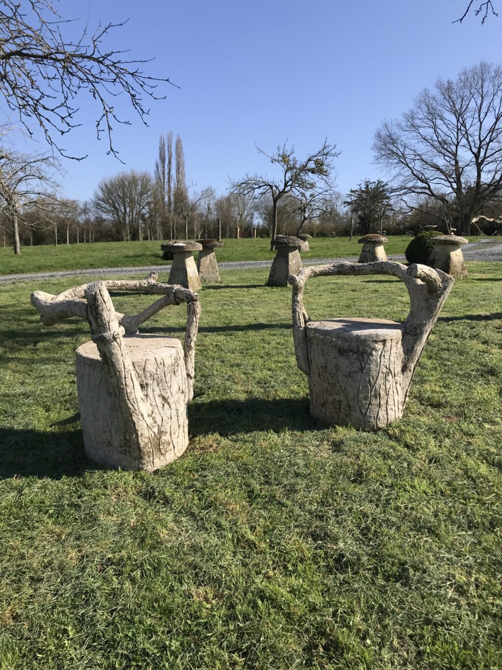 2 fauteuils faux-bois ciment