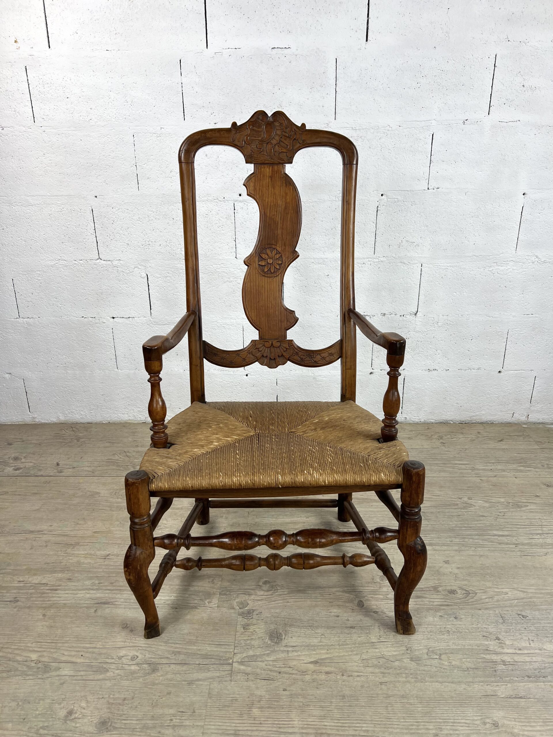 Rococo high-back chair with woven straw seat